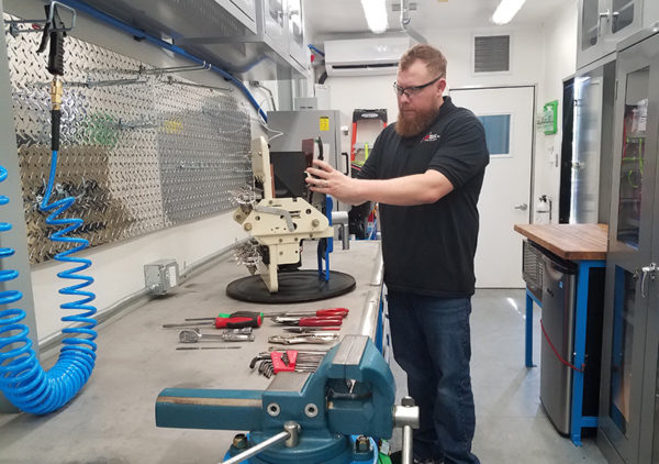 cbs nuclear technician works in mobile shop